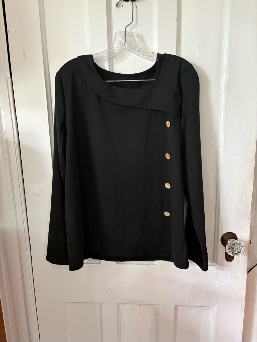 Classic Black Long-Sleeve Top with Asymmetric Button Detail